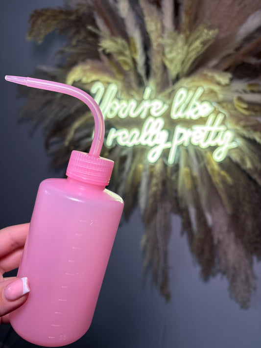 Pink lash wash bottle